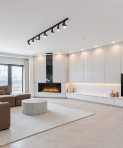 Modern-minimalist-living-room-with-beige-sofas-white-walls-a-fireplace-and-a-flat-screen-TV-on-a-white-herringbone-floor