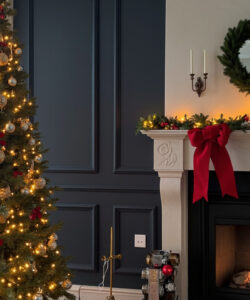 Photograph-of-a-festive-living-room-with-a-decorated-Christmas-tree-fireplace-adorned-with-greenery-and-candles