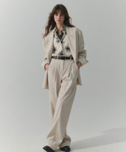 Effortless Elegance Woman In Beige Suit Floral Blouse