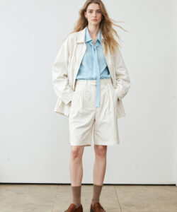 Fair Skinned Blonde Blue Shirt White Jacket Shorts Style