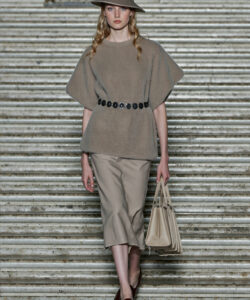 Knitted Capes Skirts And Fedoras Are Available In Comfortable Styles And Neutral Tones