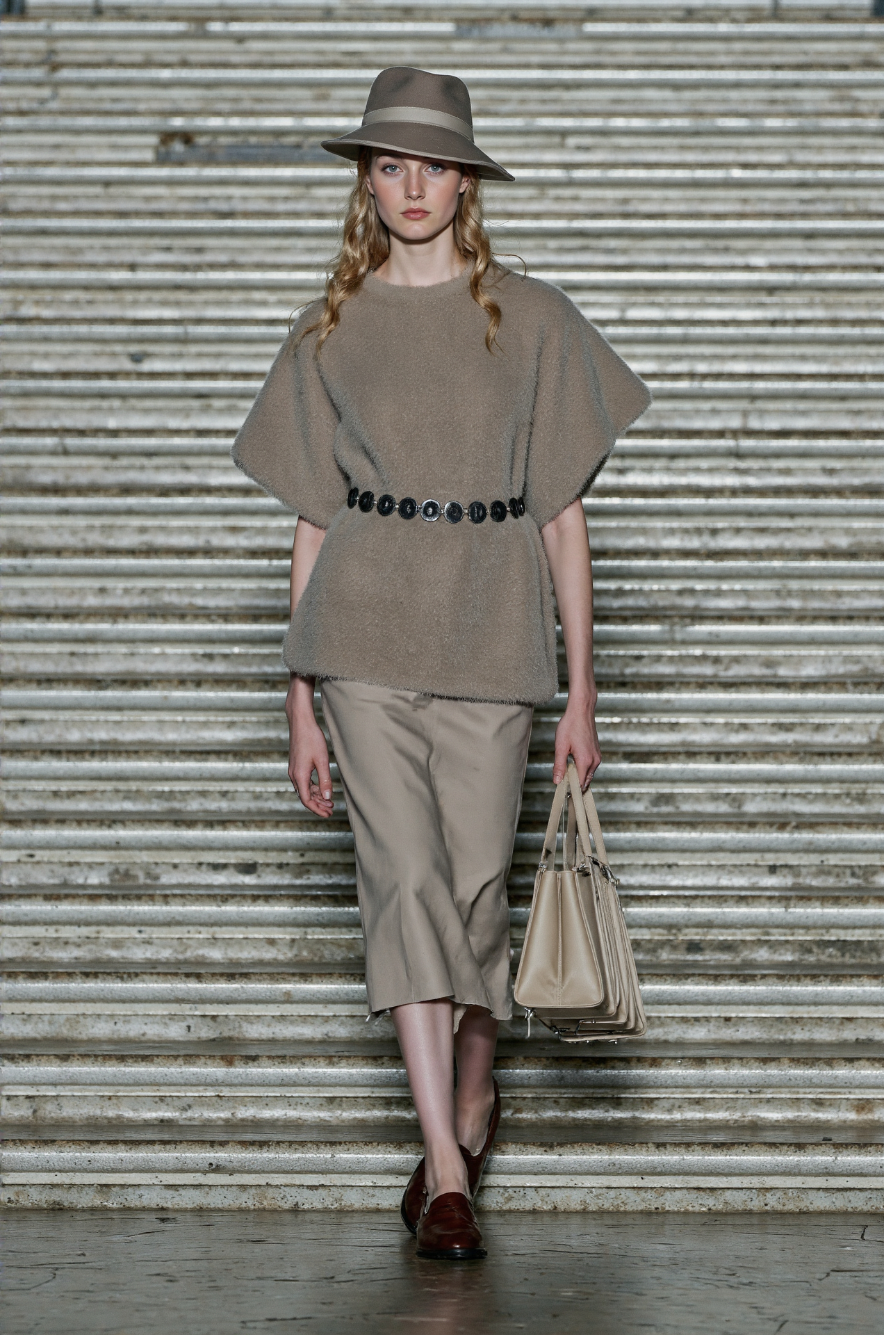 Knitted Capes Skirts And Fedoras Are Available In Comfortable Styles And Neutral Tones