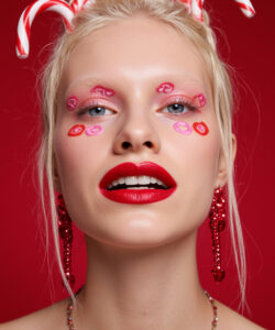 Blonde Woman With Red Lips Candy Cane Cane Headband Pink Heart Face Paint Red