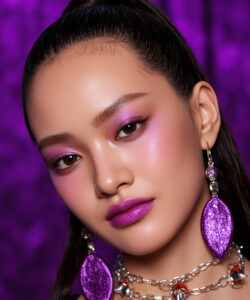 Of An Asian Woman With Flawless Skin Bold Purple Eyeshadow Glittery Earrings And Black